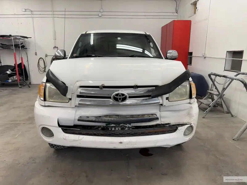 Toyota Tundra with front-end collision damage before repair